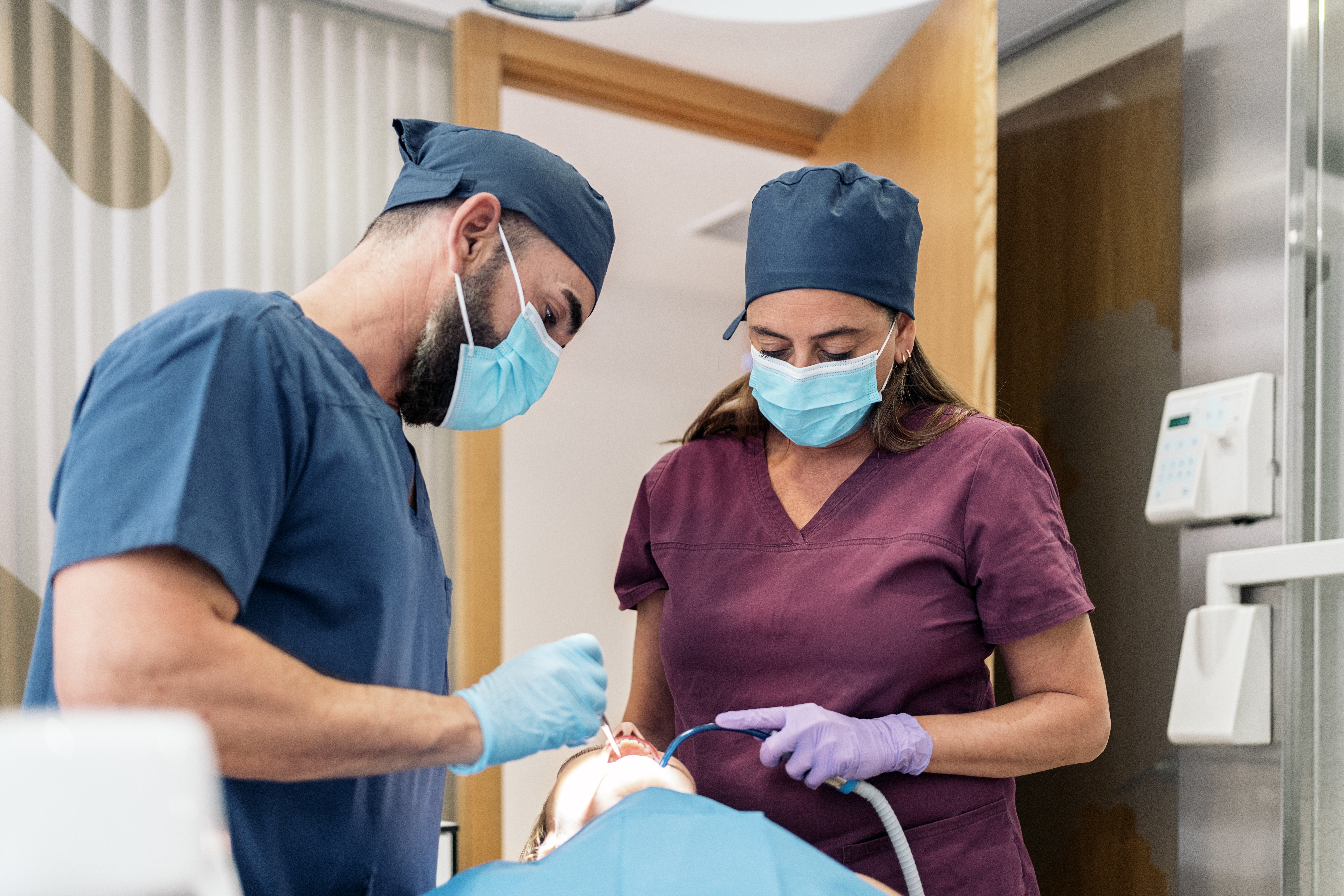 Dental Clinic Workers with a Patient
